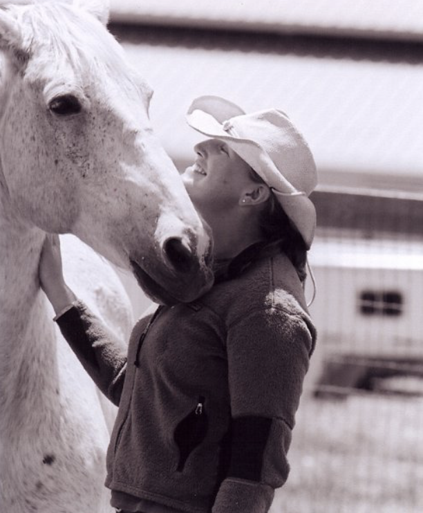 Jeanette with the horse that started it all, Lion At Large, during his retirement at Jaz Creek; photo by Cathrin Cammett