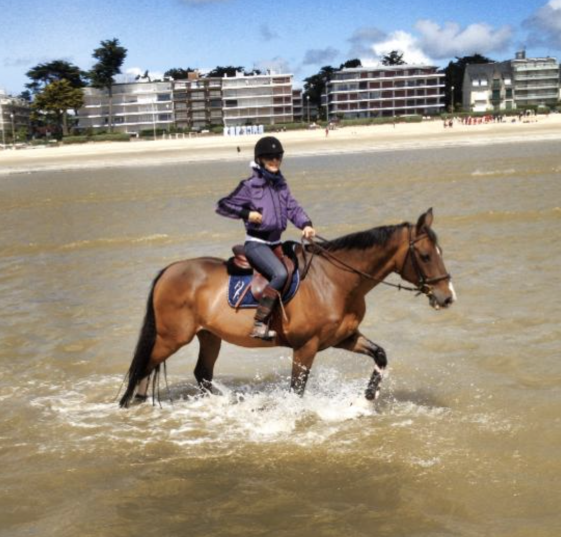 Kaylen Spooner rides Cristallo on the beach in France. Photo: Richard Spooner