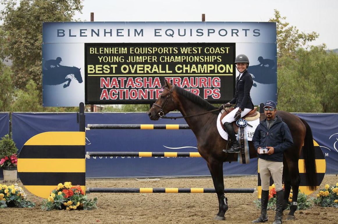 Natasha and Actiontender PS winning the Blenheim EquiSports Best Overall Young Jumper Champion (chosen by the judging panel) in the West Coast Young Jumper Championships, after being one of three winning 5-year-olds that Natasha rode in the class, all tying for the championship in the Five-Year-Old Young Jumper Champions in August. Photo: McCool Photography.