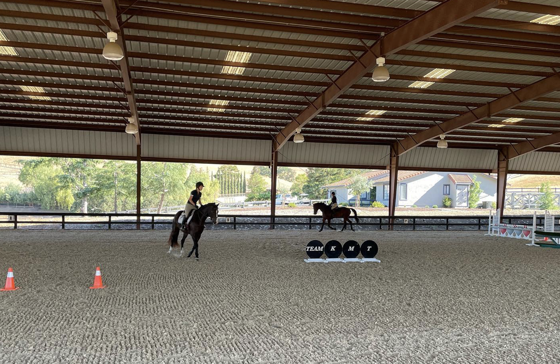 Riders practicing in the indoor at home. Photo: Kelly Maddox